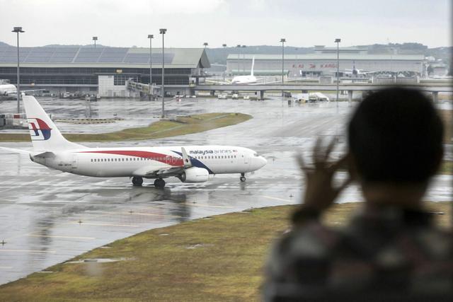 马航家属 马航MH370消失后，他们如何度过这七年