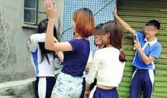 女中学生打架视频 漂亮女生被扇耳光50秒视频，实拍少女遭同学扇耳光